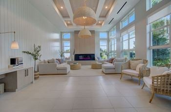 Library with fireplace and work-from-home areas